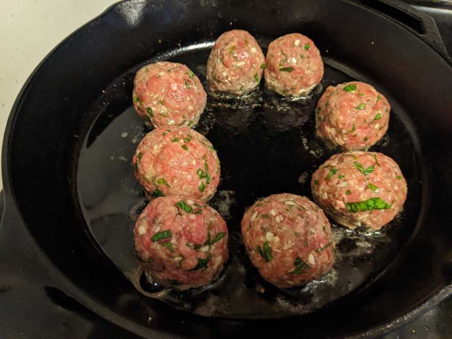 Brown meatballs on one side